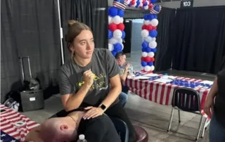 PTA students provide chair massages to military members at St. Joseph Freedom Fest