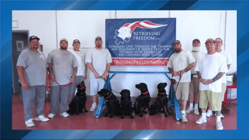 Boonville inmates help dogs advance in service training