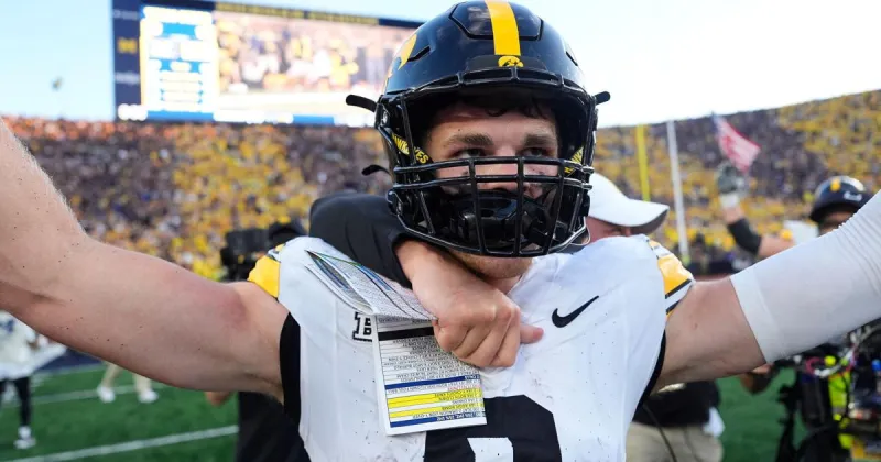 No. 17 Iowa drives for last-play TD to beat No. 18 Michigan 20-19