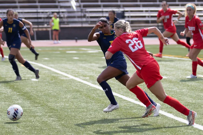 Soccer at home: No. 1 women win two games, men's team falls short