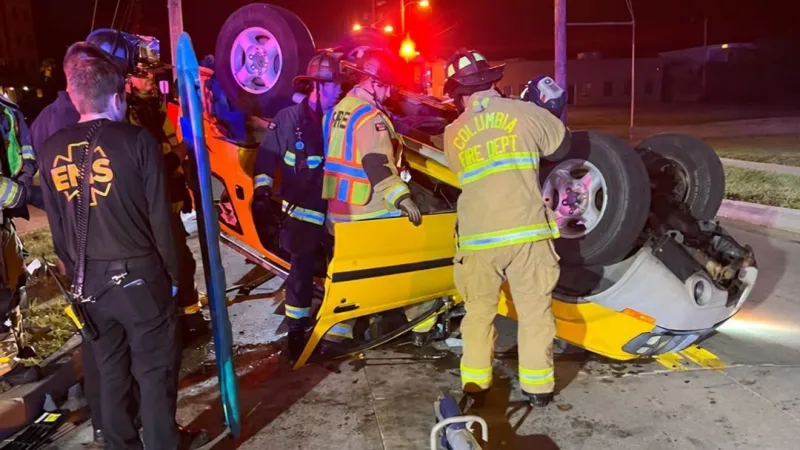 Columbia firefighters rescue person trapped in vehicle