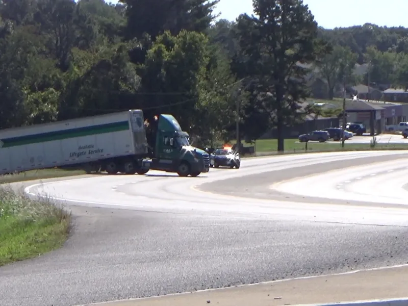 Semi high-centered on Business 49 in Neosho
