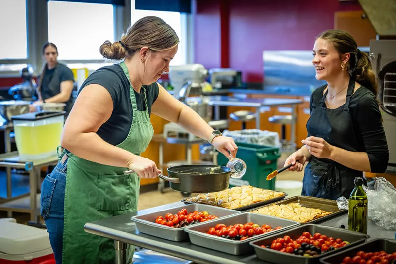Friday Night Caf students serving New Zealand culture Nov. 13