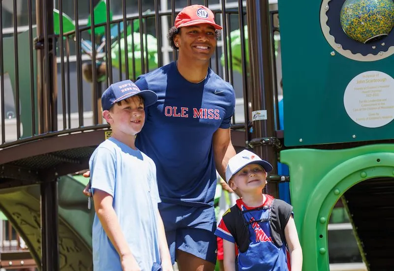 Ole Miss football players pay special visit to Children's of Mississippi patients