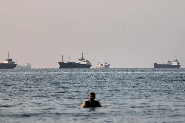 Iran will reopen the Strait of Hormuz and can sell oil freely under deal with the US, officials say