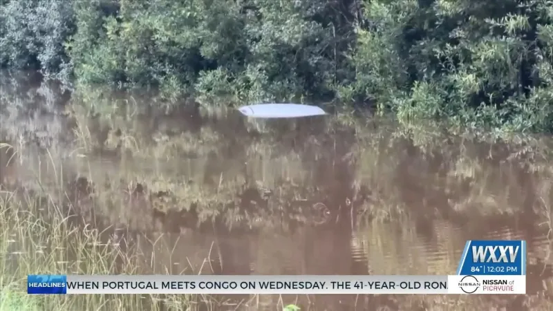 Crews rescue occupants of submerged car in Forrest County