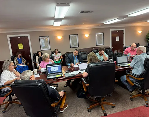 Executive session caps brief school meeting -- Several policy changes, personnel moves