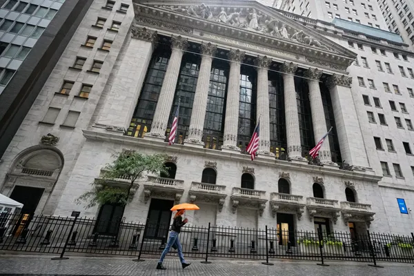 US stocks end mixed, weighed down by more losses for tech giants