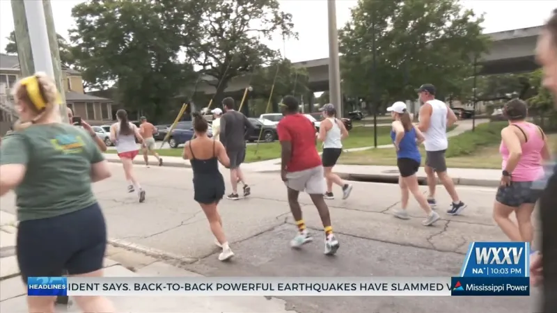 Runners gather for 'Halfway to Geaux' party for Keesler Federal Mississippi Gulf Coast Marathon