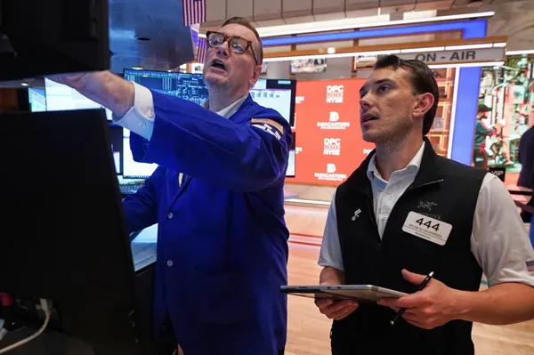 Wall Street drifts to a mixed finish after Micron soars and Apple drops