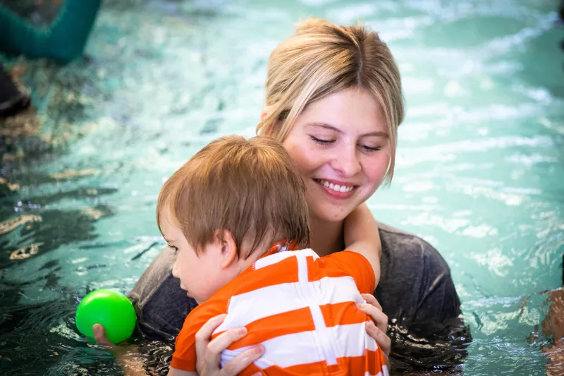 Mississippi State, Southern Miss partner to give swimming lessons to children with special needs