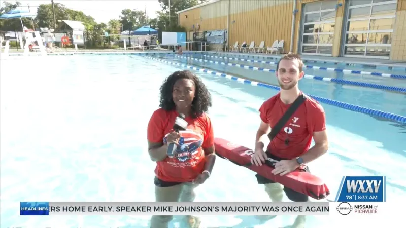 WXXV's Asia Ellis tests the new pool at the YMCA in Ocean Springs