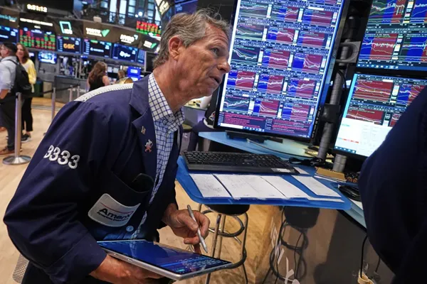 The Dow hits a record as most of Wall Street rises, but slumping AI stocks keep indexes mixed