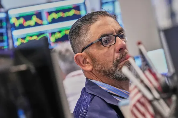 World shares are mixed after Dow hits a new record, as some AI shares bounce back