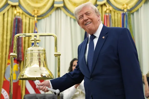 Trump rings Wall Street's opening bells as he ties his presidency to stock market gains