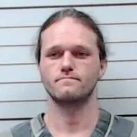 Mooreville man held on charge of molesting a minor