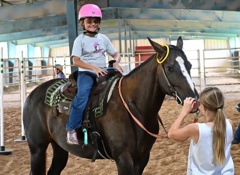 4H Camp:Taking Aim and Taking the Reins