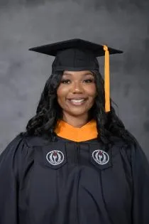 Asia Eichelberger earns third college degree