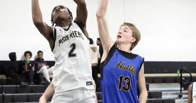 Summer Building: Panther hoops laying foundation under Wallace