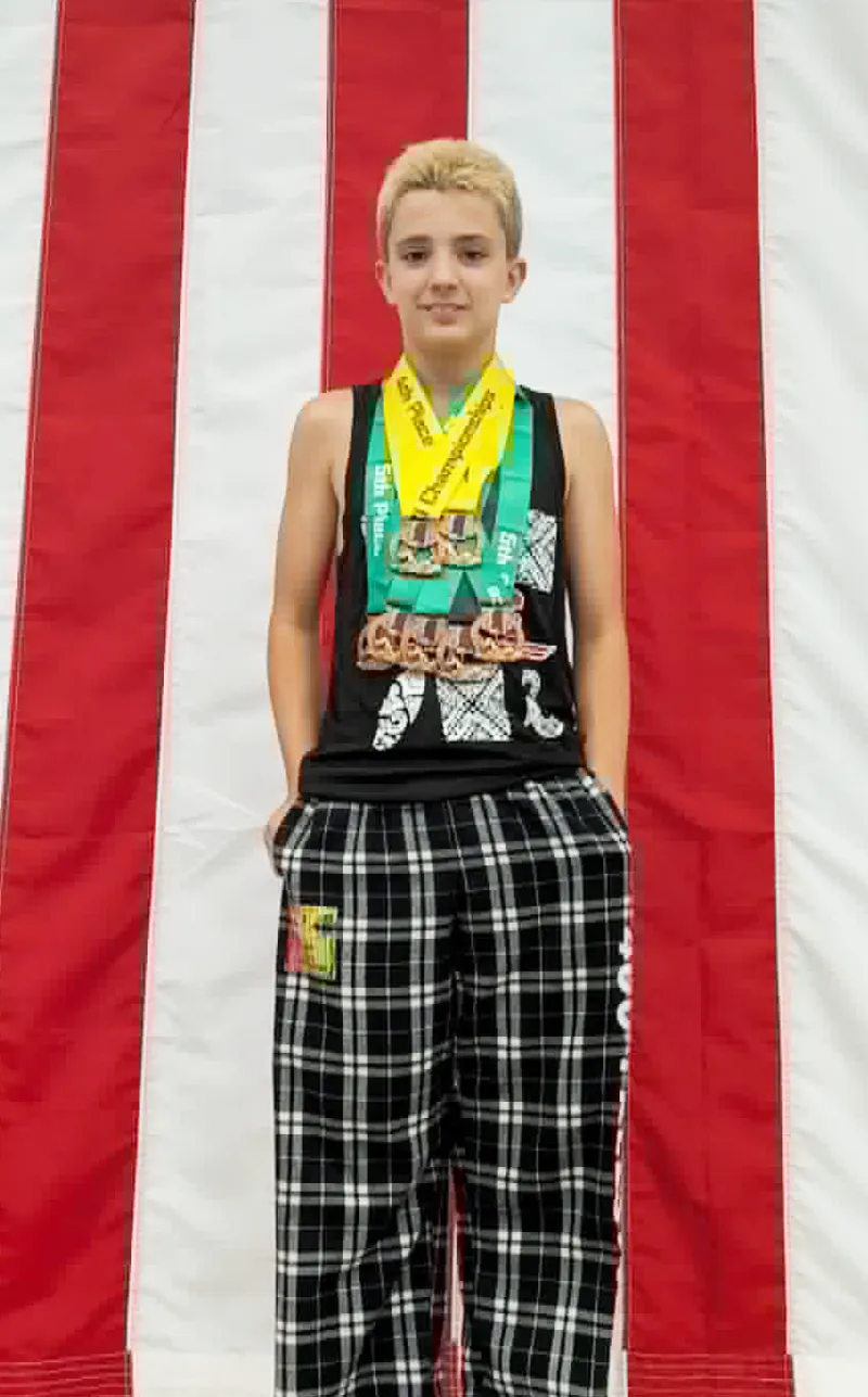 TOP Swim wins State medals; Robinson qualifies for Olympic Trials