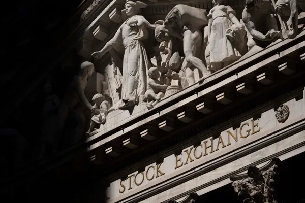 US stocks edge down from their record after oil prices climb 5%