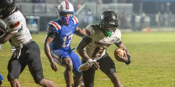 Lumberton runs past North Forrest behind Adams four touchdowns