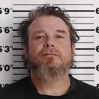 Booneville man charged with attacking someone with vehicle