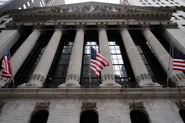 US stocks slip after the Fed hikes interest rates and hints more increases may be on the way