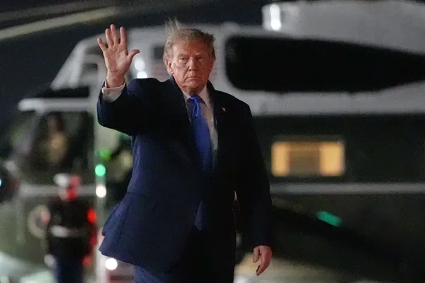Judge hears arguments without immediate ruling in lawsuit over White House ban on 3 news outlets