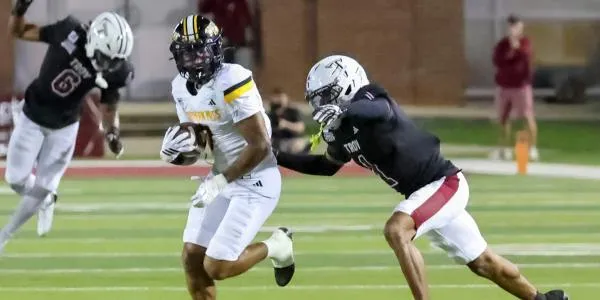Troy rushes for 437 yards, embarrasses Southern Miss 55-34 to open conference play