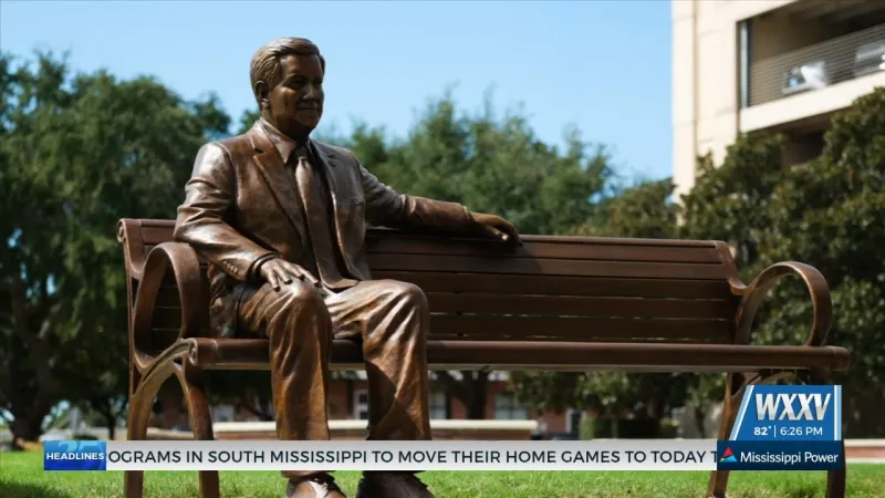 Hancock Whitney Bank honors late George Schloegel with statue
