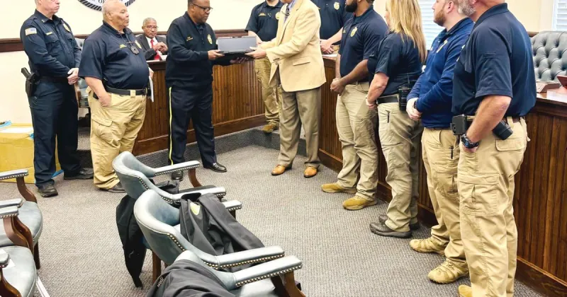 D.A.'s office donates laptops to LPD
