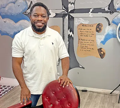 Gregory Walton has built more than a barbershop in Bruce