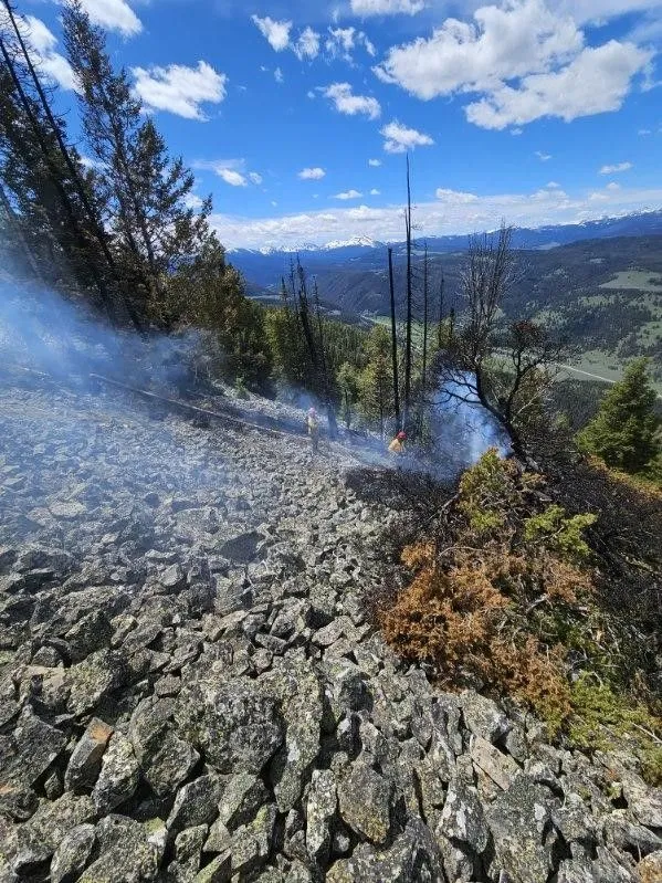 Burnt Top fire smolders south of Big Sky