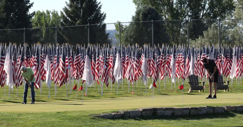 Photo: Breakfast Exchange Club flags on display at Par 3 Golf Course