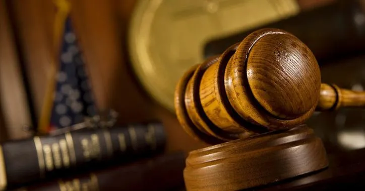 Huson man pleads not guilty to firing rounds at former boss's shop
