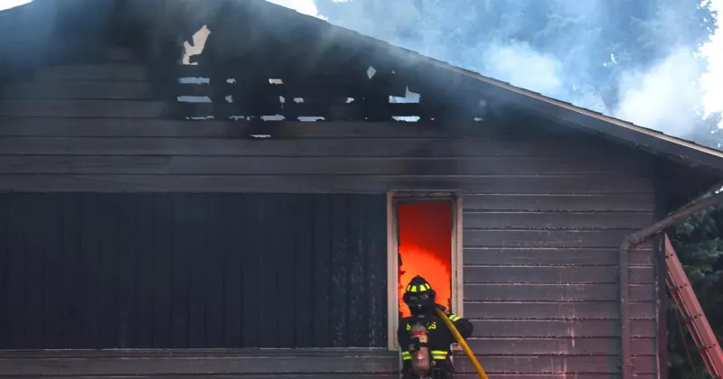 Photos: House that burned Friday rekindles Sunday morning