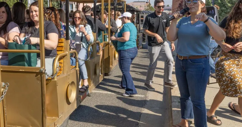 New Helena Public Schools educators hop aboard tour train to meet community partners