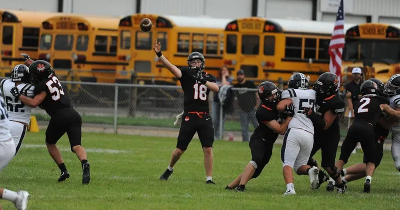 Manhattan's Tyson Pavlik throws 5 touchdown passes as Manhattan routs Anaconda to begin title defense