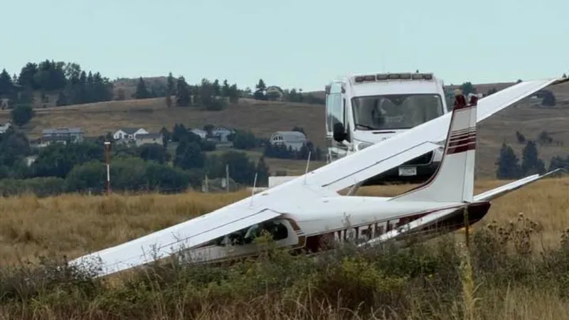 Pilot uninjured after small plane crashes through fence near Polson Airport