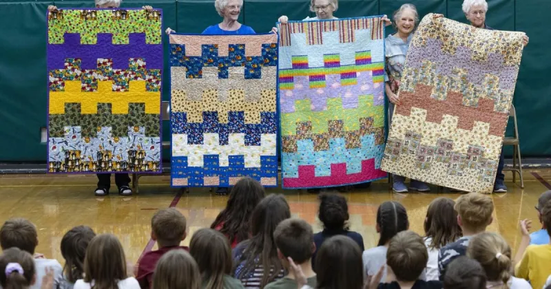 Local quilting group blankets Helena schools with 65 donated comforters