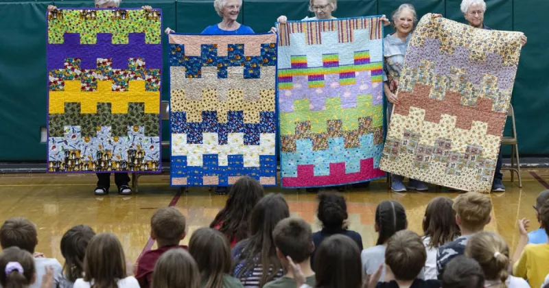 Local quilting group blankets Helena schools with 65 donated comforters