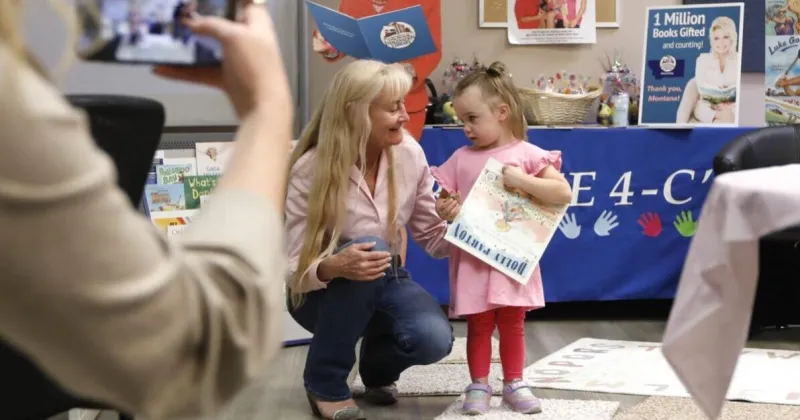 Butte child receives millionth Dolly Parton Imagination Library book in Montana