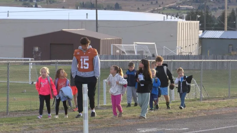 Butte youth walk to school with Montana Tech athletes