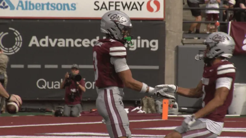 Davis' 205 yards, Ah Yat's five TD passes power Griz past Northern Colorado on Homecoming
