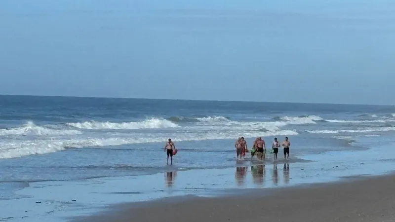 Firefighters in North Topsail Beach tackle swim and course in yearly endurance exam