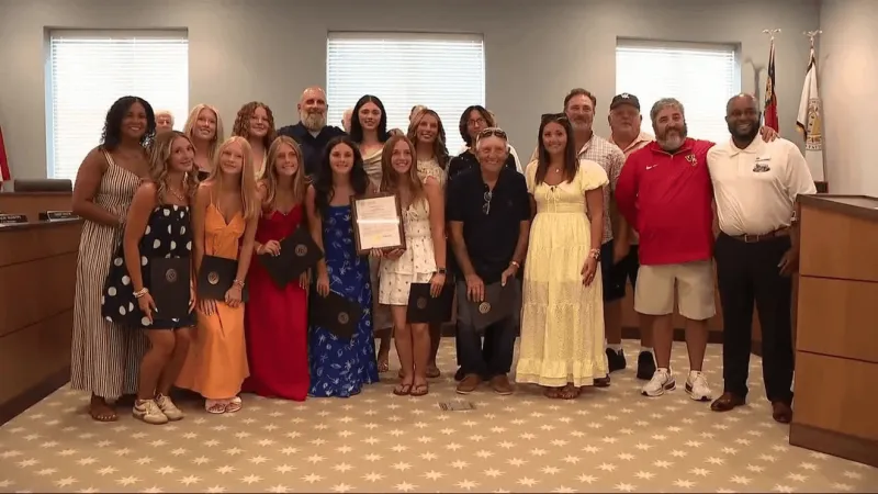 Hurricanes even series after 5-3 win, West Carteret Softball receives proclamation plaque