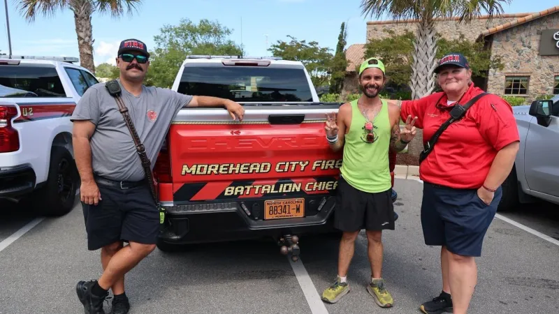 Morehead City firefighters assist cross-country walker on mental health mission