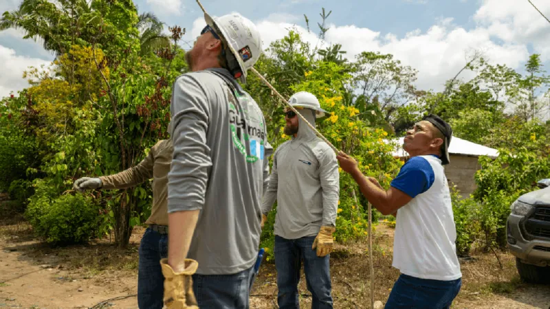 ENC line workers help bring electricity to Guatemalan village for the first time