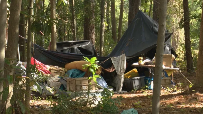 Despite local concerns, homeless camp bill heads to Gov. Josh Stein